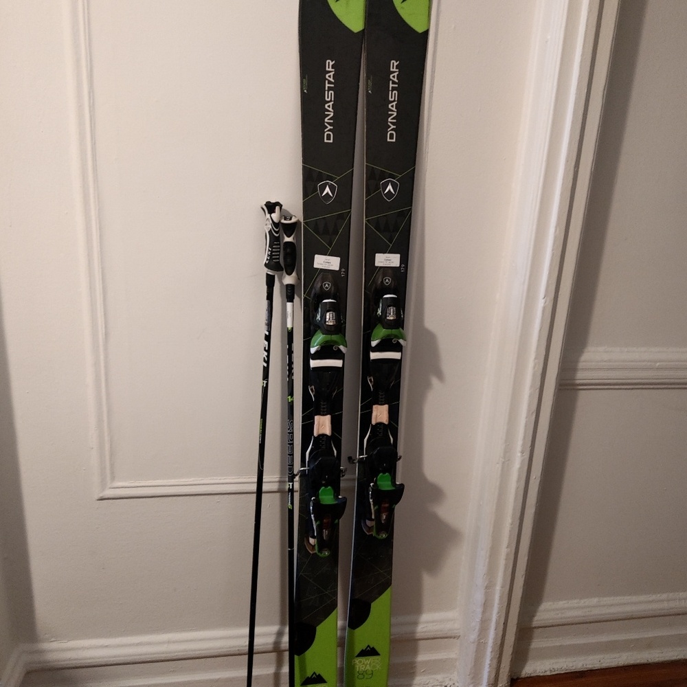 Skies with poles and bindings